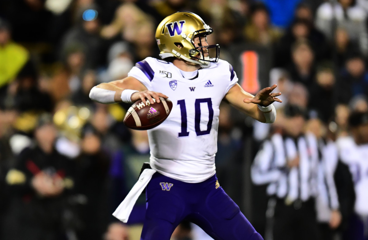 Nov 23, 2019; Boulder, CO, USA; Washington Huskies quarterback Jacob Eason (10) drops back to pass the ball against the Colorado Buffaloes in the first quarter at Folsom Field. Mandatory Credit: Ron Chenoy-USA TODAY Sports