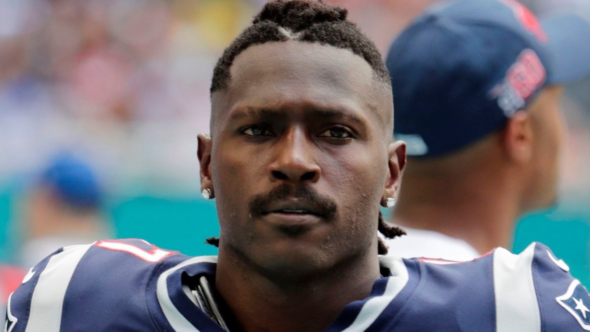 New England Patriots wide receiver Antonio Brown on the sidelines, during the first half at an NFL football game against the Miami Dolphins in Miami Gardens, Fla.