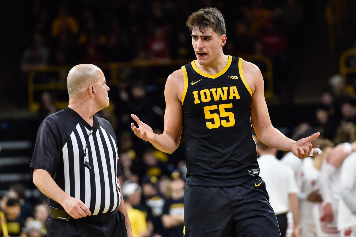 Iowa City, Iowa, USA; Iowa Hawkeyes center Luka Garza (55) talks to an official against the Wisconsin Badgers during the first half at Carver-Hawkeye Arena. Mandatory Credit: Jeffrey Becker-USA TODAY Sports