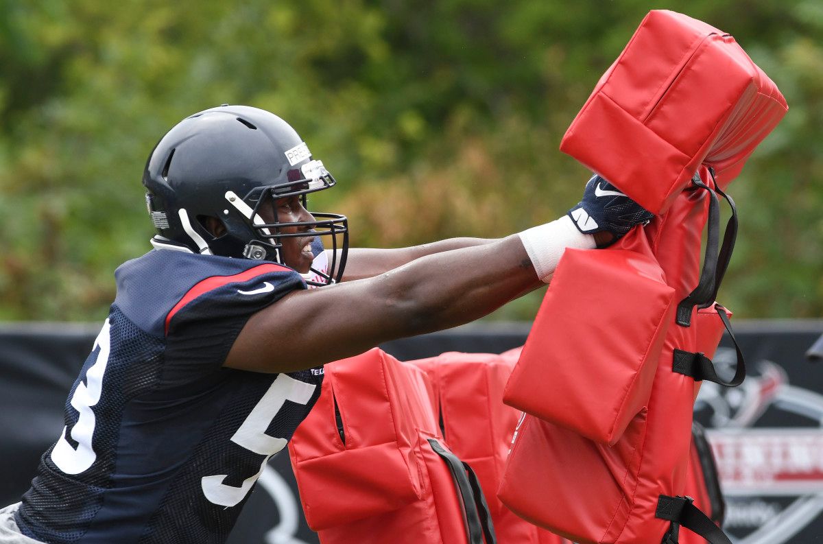 Houston Texans outside linebacker Gimel President (53) hits a blocking sled during the 2017 training camp at The Greenbrier.