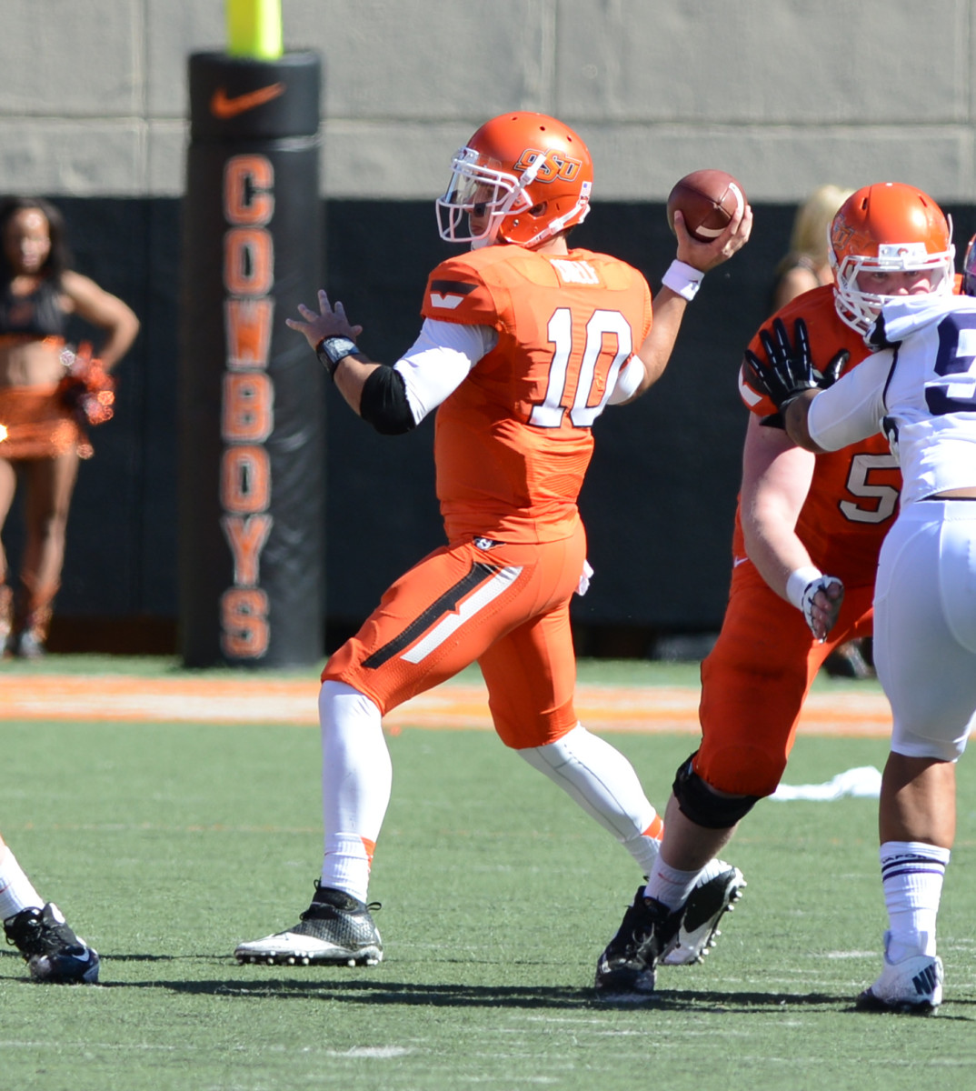 Clint Chelf turned out to be a dangerous dual threat quarterback in the Oklahoma State offense. 