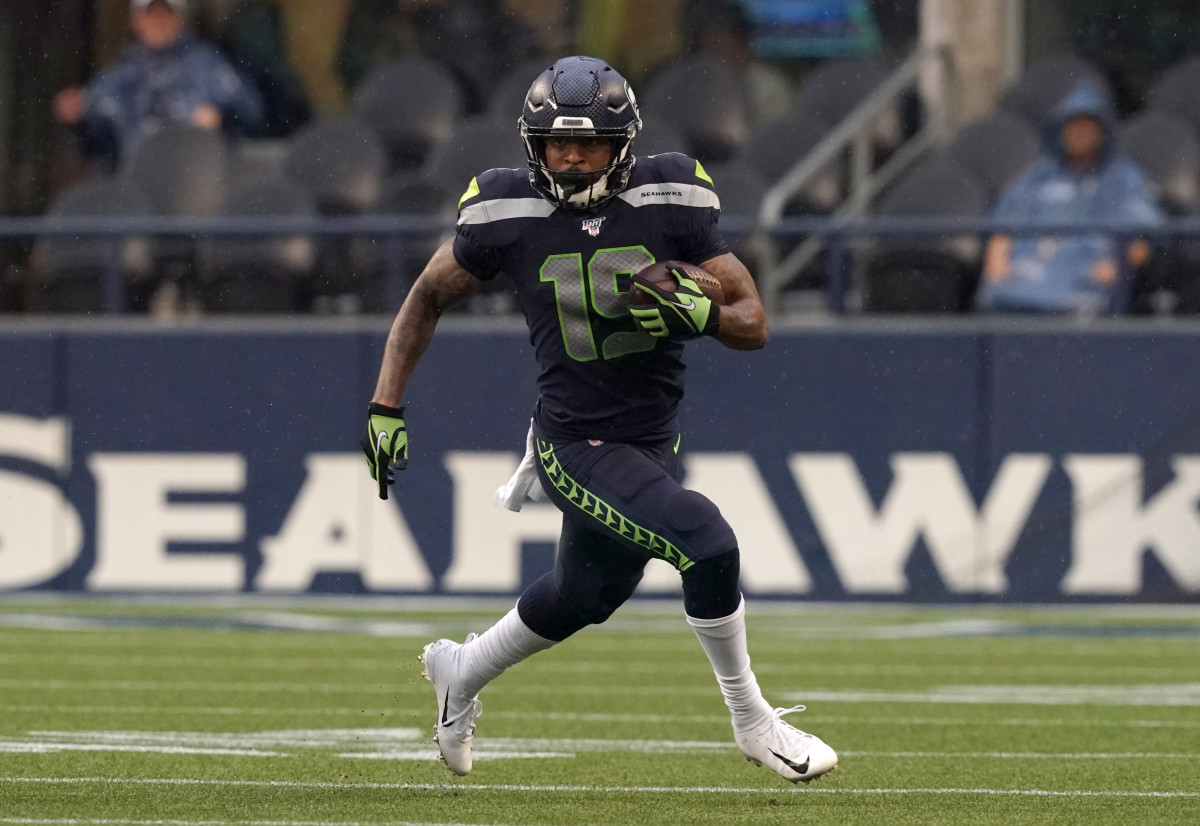 Seattle Seahawks wide receiver Keenan Reynolds (19) carries the ball in the first quarter against the Oakland Raiders at CenturyLink Field.
