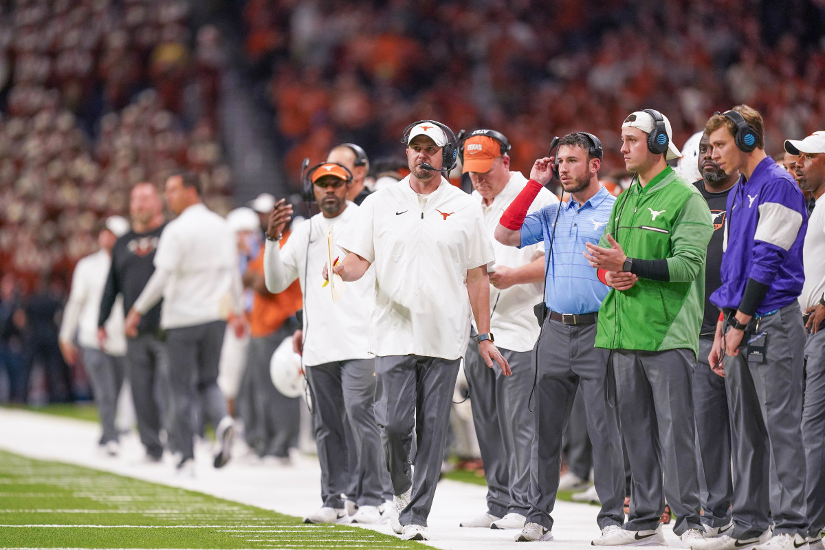 Texas head coach Tom Herman has juggled a lot of his football staff and apparently liked a lot of Big 12 assistant coaches and wound up with two former Big 12 assistants and one current one.