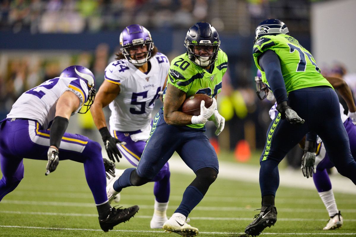 Seattle Seahawks running back Rashaad Penny (20) carries the ball against the Minnesota Vikings during the first half at CenturyLink Field.