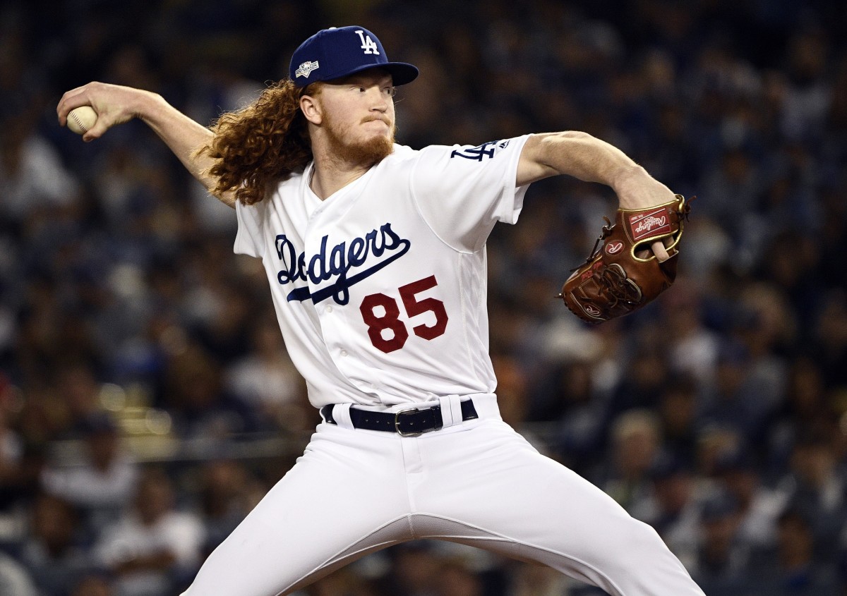 October 4, 2019; Los Angeles, CA, USA; Los Angeles Dodgers starting pitcher Dustin May (85) throws against the Washington Nationals during the seventh inning in game two of the 2019 NLDS playoff baseball series at Dodger Stadium. Mandatory Credit: Robert Hanashiro-USA TODAY Sports