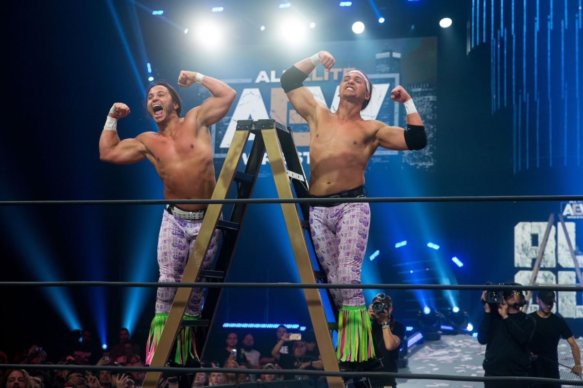 Matt and Nick Jackson (The Young Bucks) pose in the ring at AEW All Out