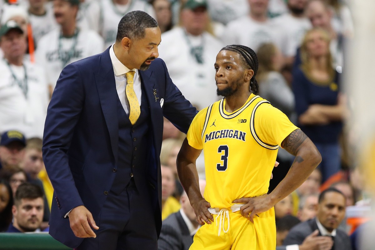 Michigan point guard Zavier Simpson can become Michigan's all-time winner on Sunday. 