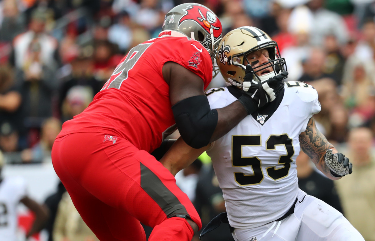 Nov 17, 2019; Tampa, FL, USA;Tampa Bay Buccaneers offensive tackle Demar Dotson (69) blocks New Orleans Saints outside linebacker A.J. Klein (53) during the first half at Raymond James Stadium. Mandatory Credit: Kim Klement-USA TODAY Sports