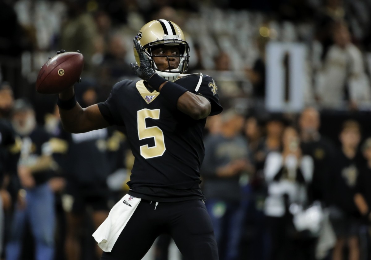 New Orleans Saints quarterback Teddy Bridgewater (5) throws during warm ups prior to kickoff against the Carolina Panthers at the Mercedes-Benz Superdome.