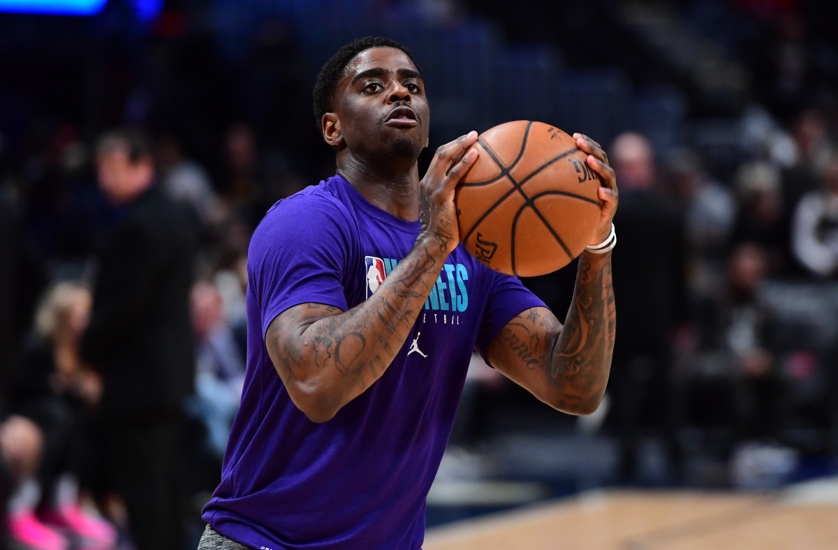 Jan 15, 2020; Denver, Colorado, USA; Charlotte Hornets guard Dwayne Bacon (7) warms up before a game against the Denver Nuggets at the Pepsi Center. Mandatory Credit: Ron Chenoy-USA TODAY Sports