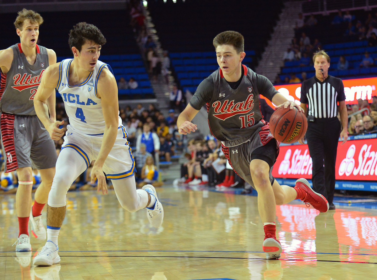 February 2, 2020; Los Angeles, California, USA; Utah Utes guard Rylan Jones (15) moves to the basket against UCLA Bruins guard Jaime Jaquez Jr. (4) during the first half at Pauley Pavilion.