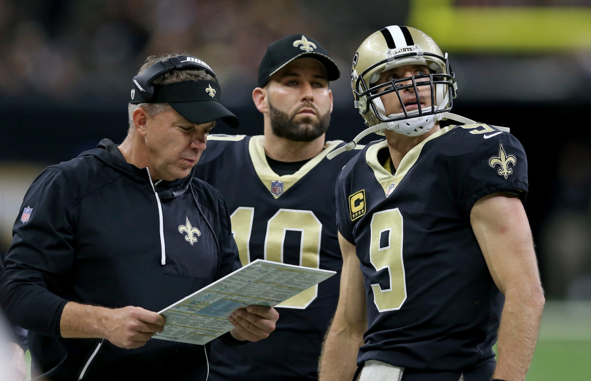Nov 19, 2017; New Orleans, LA, USA; New Orleans Saints head coach Sean Payton and New Orleans Saints quarterback Drew Brees (9) talk on the sidelines in the second half against the Washington Redskins at the Mercedes-Benz Superdome. New Orleans Saints quarterback Chase Daniel (10) is in background. The Saints won, 34-31 in overtime. Mandatory Credit: Chuck Cook-USA TODAY Sports