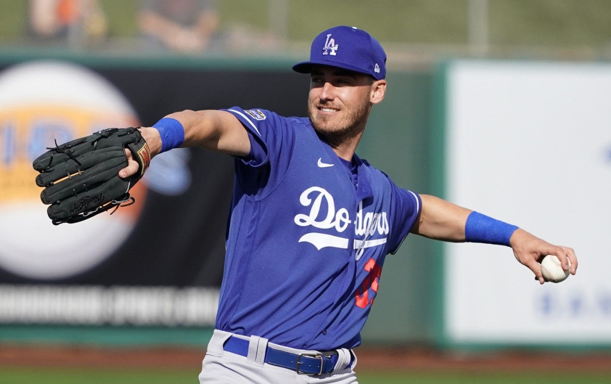 Feb 22, 2020; Scottsdale, Arizona, USA; Los Angeles Dodgers center fielder Cody Bellinger (35) warms up before a game against the San Francisco Giants at Scottsdale Stadium. Mandatory Credit: Rick Scuteri-USA TODAY Sports