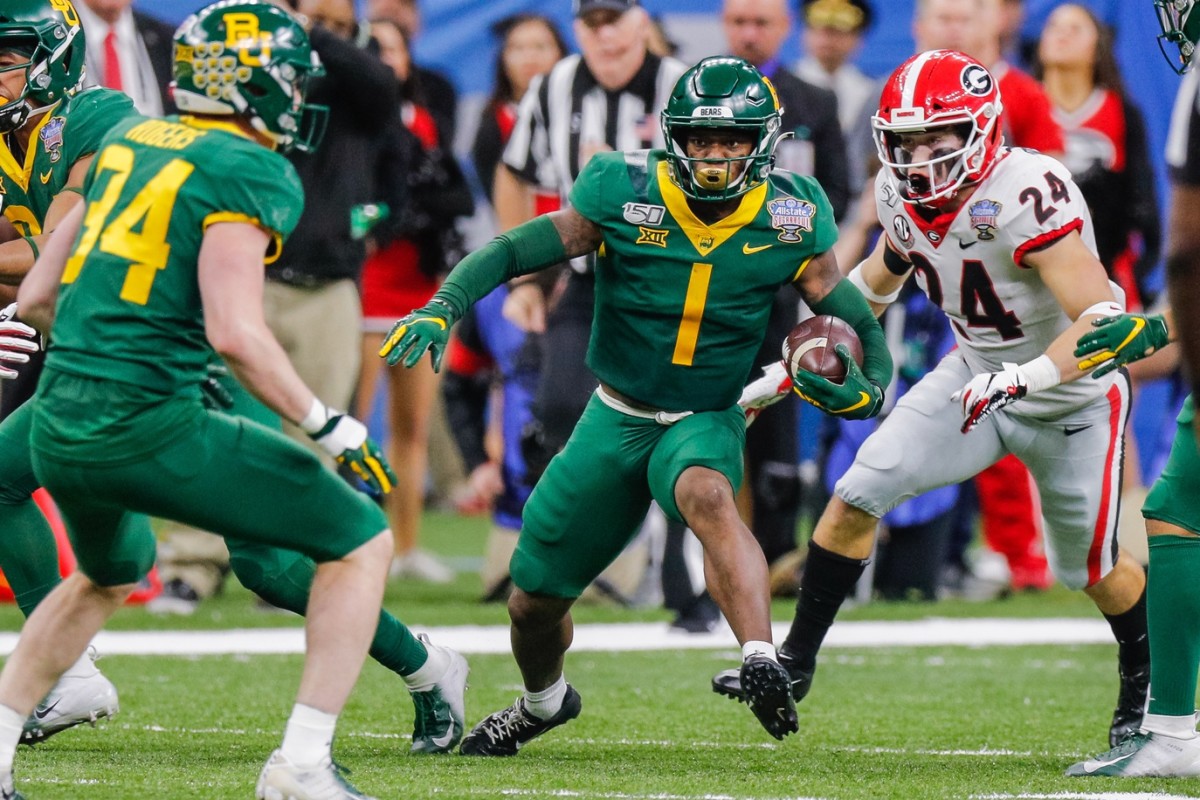 Jan 1, 2020; New Orleans, Louisiana, USA; Baylor Bears cornerback Grayland Arnold (1) runs with the ball after an interception against Georgia Bulldogs at Mercedes-Benz Superdome.