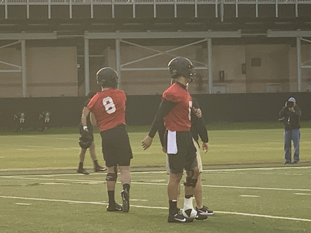 Vanderbilt freshman quarterback Ken Seals (8) throws a pass during spring practice while fellow QB Jeremy Mussa (6) red jersey to the right looks on.  