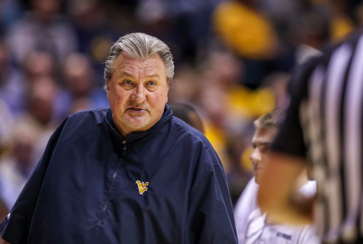 West Virginia Mountaineers head coach Bob Huggins argues a call during the second half against the Oklahoma State Cowboys at WVU Coliseum.