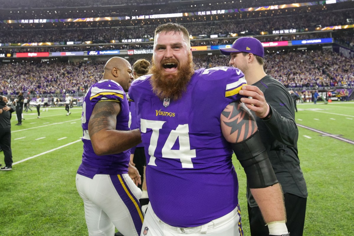 Minnesota Vikings offensive lineman Mike Remmers (74) celebrates after the game against the New Orleans Saints at U.S. Bank Stadium.