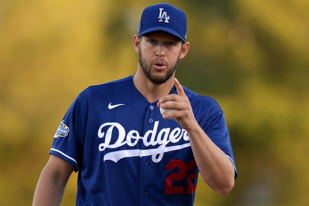 Mar 4, 2020; Phoenix, Arizona, USA; Los Angeles Dodgers starting pitcher Clayton Kershaw (22) reacts during the first inning of a spring training game against the San Francisco Giants at Camelback Ranch. Mandatory Credit: Joe Camporeale-USA TODAY Sports