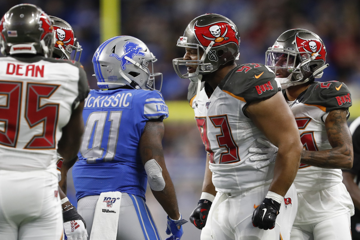 Tampa Bay Buccaneers nose tackle Ndamukong Suh (93) yells at Detroit Lions running back J.D. McKissic (41) during the second quarter at Ford Field.