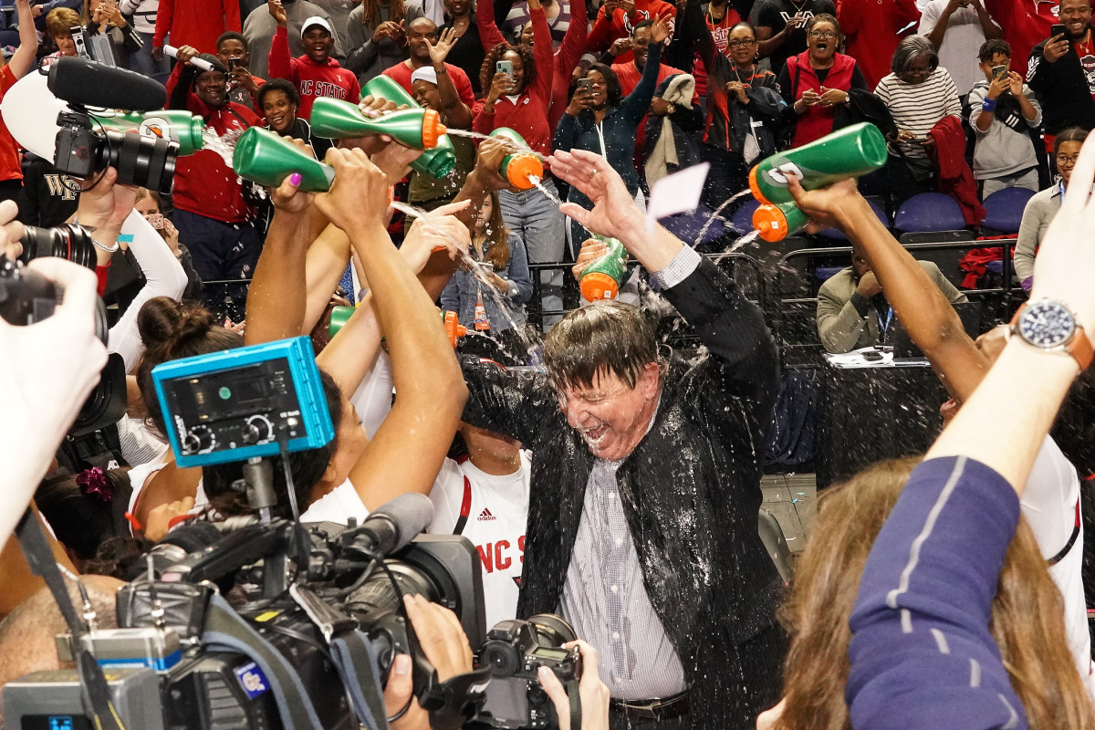 Wolfpack coach Wes Moore gets a championship shower