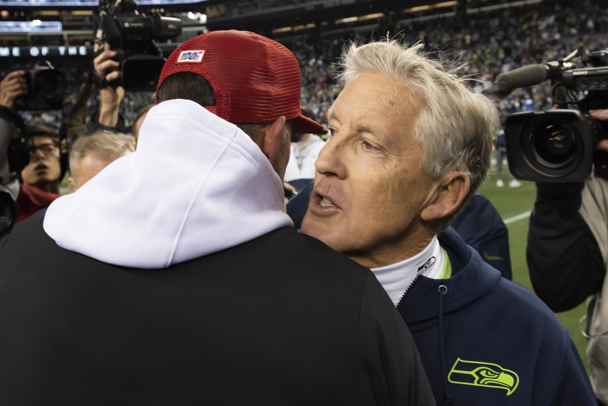 San Francisco 49ers head coach Kyle Shanahan and Seattle Seahawks head coach Pete Carroll greet after the game at CenturyLink Field. San Francisco defeated Seattle 26-21.
