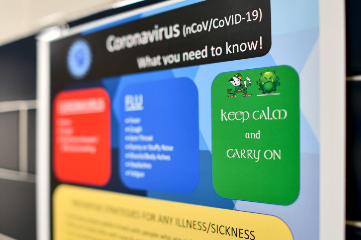 An informational sign on Coronavirus is posted in a restroom at the Purcell Pavilion before the game between the Notre Dame Fighting Irish and the Virginia Tech Hokies.