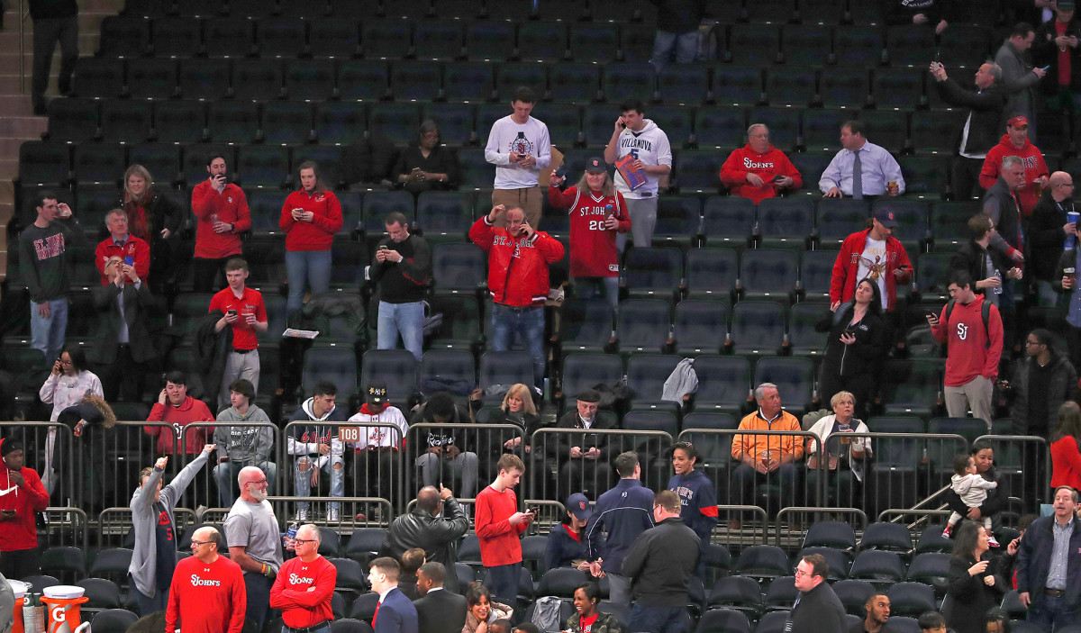 Fans after the mid-game cancellation of the Big East tournament at Madison Square Garden.