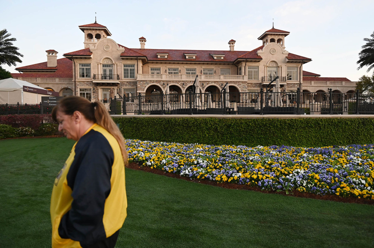 A security guard walks by after the cancellation of The Players Championship at TPC Sawgrass.