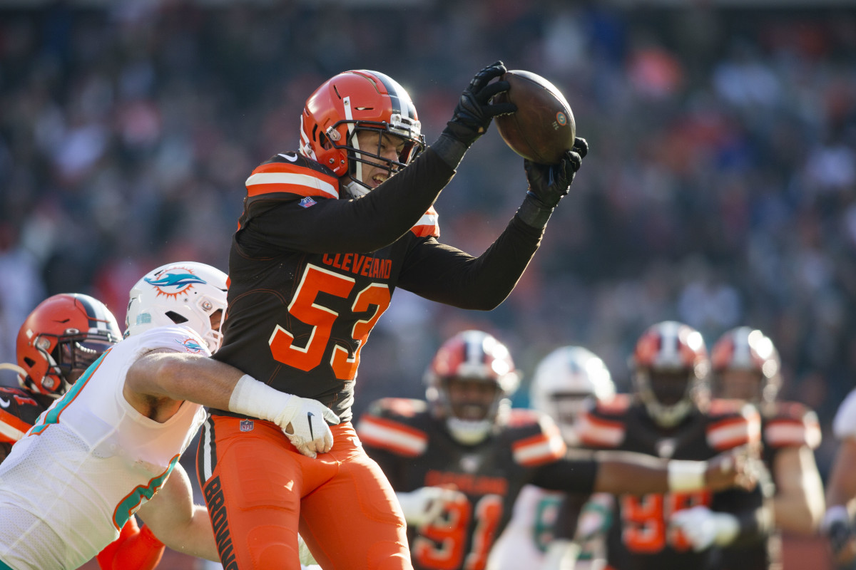 Nov 24, 2019; Cleveland, OH, USA; Cleveland Browns middle linebacker Joe Schobert (53) intercepts the ball from Miami Dolphins quarterback Ryan Fitzpatrick (14) during the second quarter at FirstEnergy Stadium. Mandatory Credit: Scott R. Galvin-USA TODAY Sports