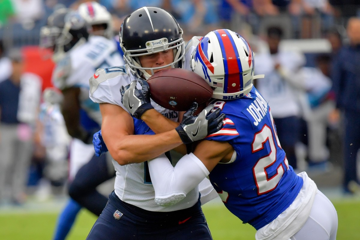 Buffalo Bills cornerback Kevin Johnson (29) breaks up a pass intended for Tennessee Titans wide receiver Adam Humphries (10) during the first half at Nissan Stadium.