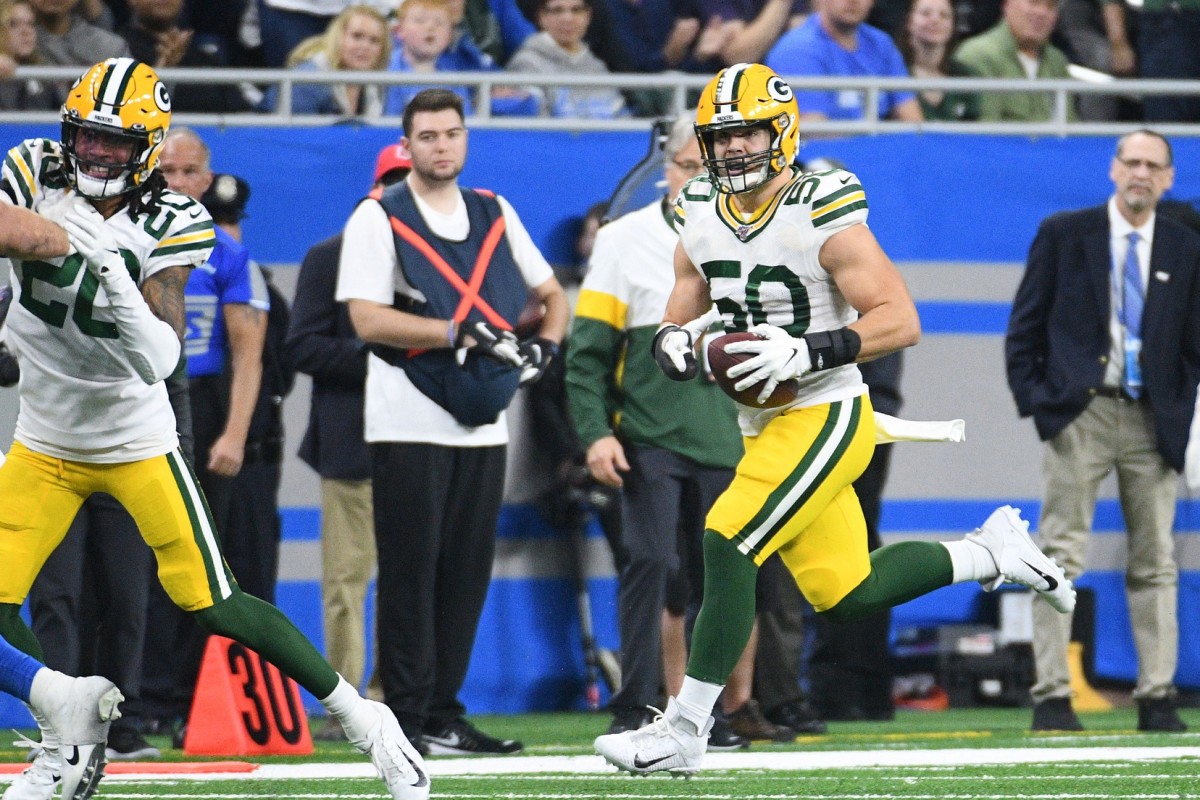 Dec 29, 2019; Detroit, Michigan, USA; Green Bay Packers inside linebacker Blake Martinez (50) runs the ball after an interception during the fourth quarter against the Detroit Lions at Ford Field. Mandatory Credit: Tim Fuller-USA TODAY Sports