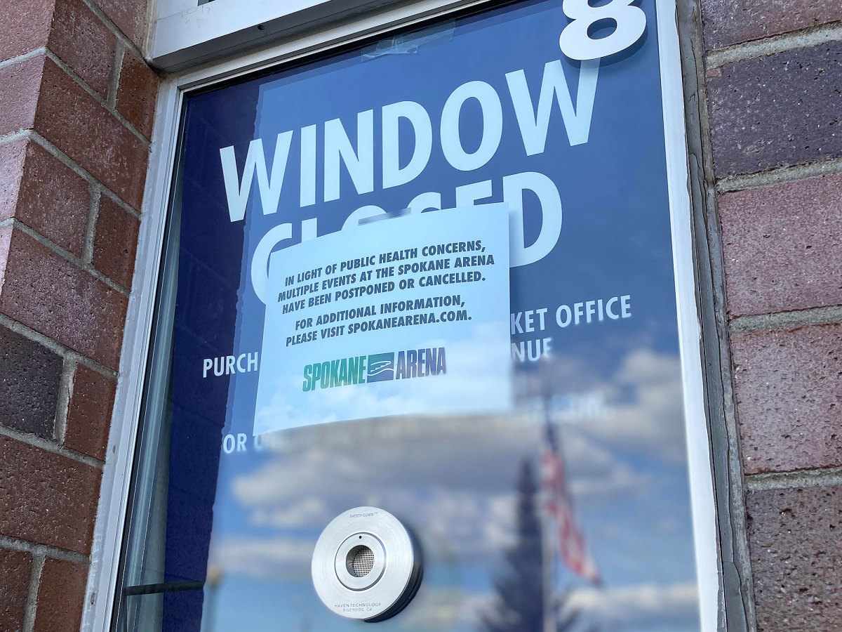 A ticket window outside Spokane Arena carries news of event cancellations due to COVID-19.