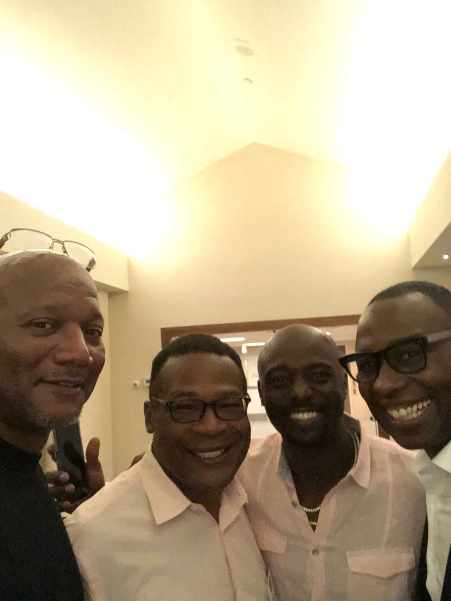 Rob Carpenter with Jets alumni Blair Thomas, Santonio Holmes and Tony Richardson.