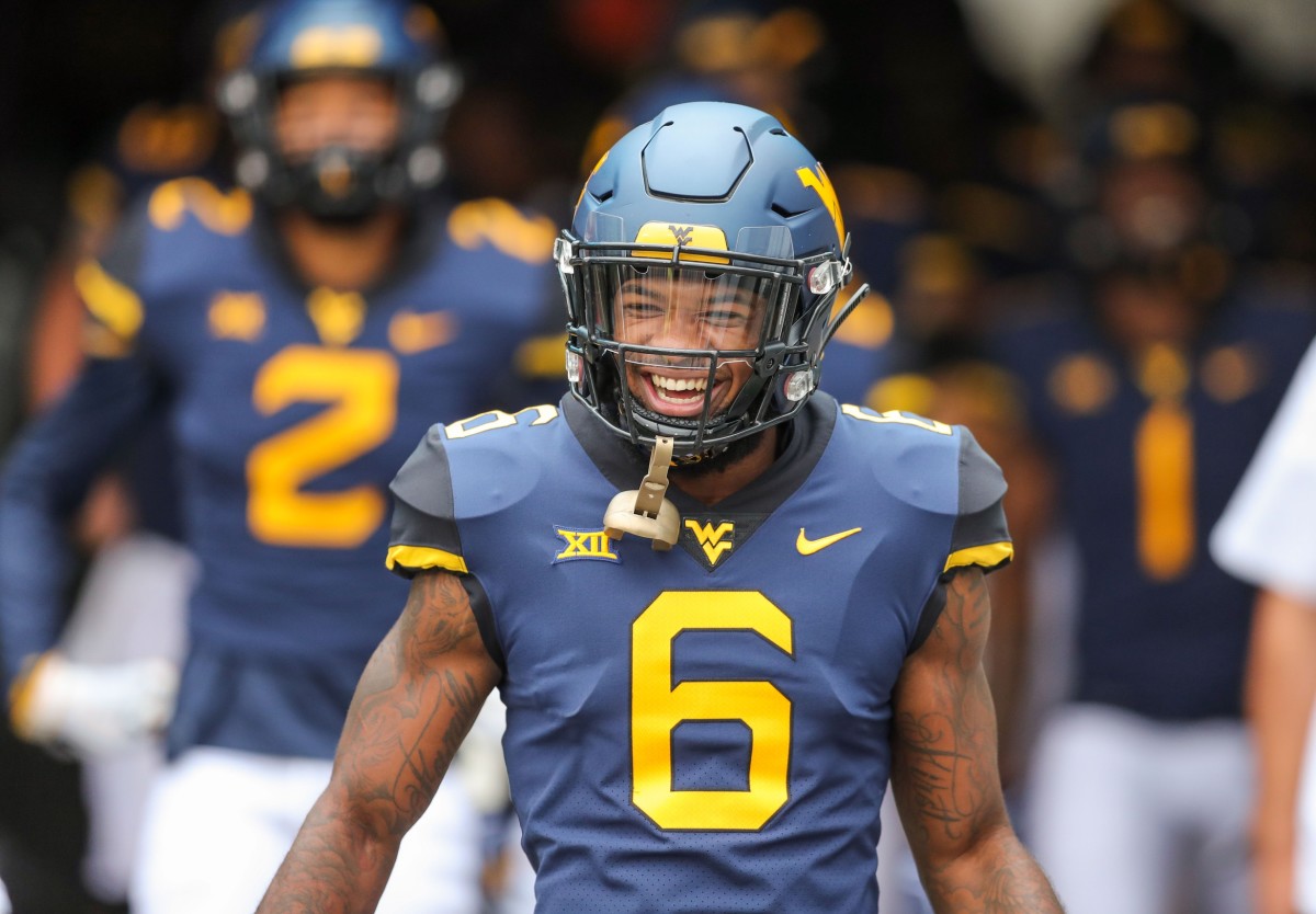 Sep 8, 2018; Morgantown, WV, USA; West Virginia Mountaineers safety Dravon Askew-Henry (6) runs out of the tunnel before their game against the Youngstown State Penguins at Mountaineer Field at Milan Puskar Stadium.