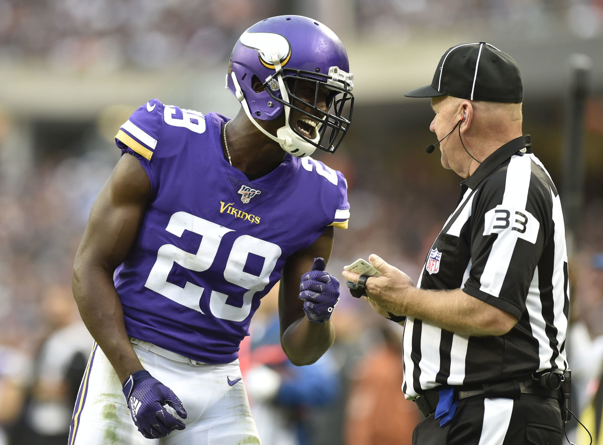 Minnesota Vikings cornerback Xavier Rhodes, shown chatting with a referee during a 2019 game, has signed with the Indianapolis Colts.