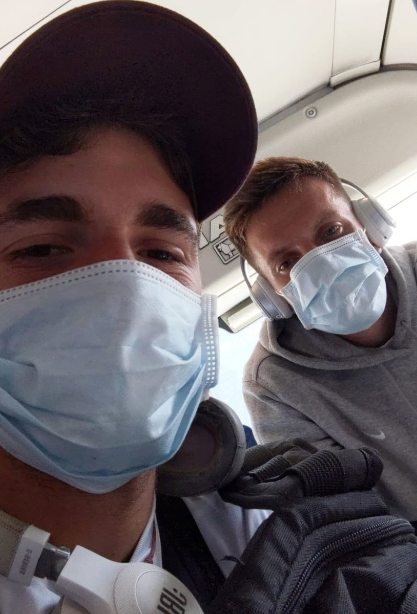 Mississippi State tennis players Giovanni Oradini (right) and Davide Tortora while they flew from Frankfurt to Venice.