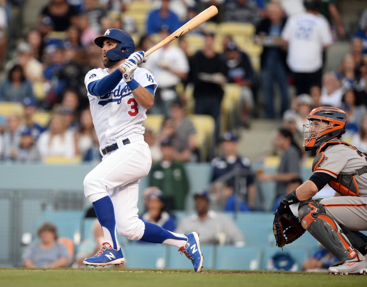 June 19, 2019; Los Angeles, CA, USA; Los Angeles Dodgers shortstop Chris Taylor (3) hits a three run home run against the San Francisco Giants during the first inning at Dodger Stadium. Mandatory Credit: Gary A. Vasquez-USA TODAY Sports
