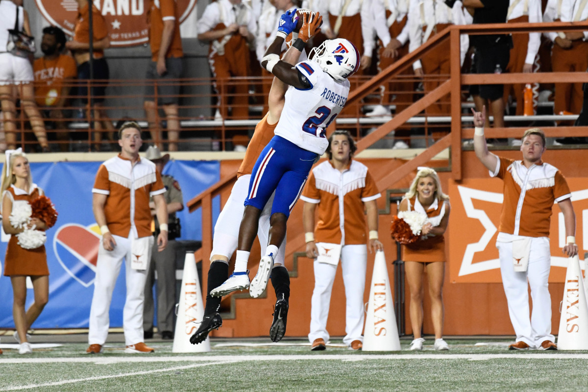 Aug 31, 2019; Austin, TX, USA; Texas Longhorns wide receiver Jake Smith (16) attempts to make a catch with Louisiana Tech Bulldogs cornerback Amik Robertson (21) defending in the second half at Darrell K Royal-Texas Memorial Stadium. Mandatory Credit: Scott Wachter-USA TODAY Sports