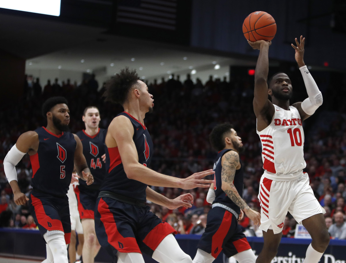 Dayton's Jalen Crutcher scored on lay-ups, runners like this, and a pair of three pointers as well in the win over the Buckeyes. 