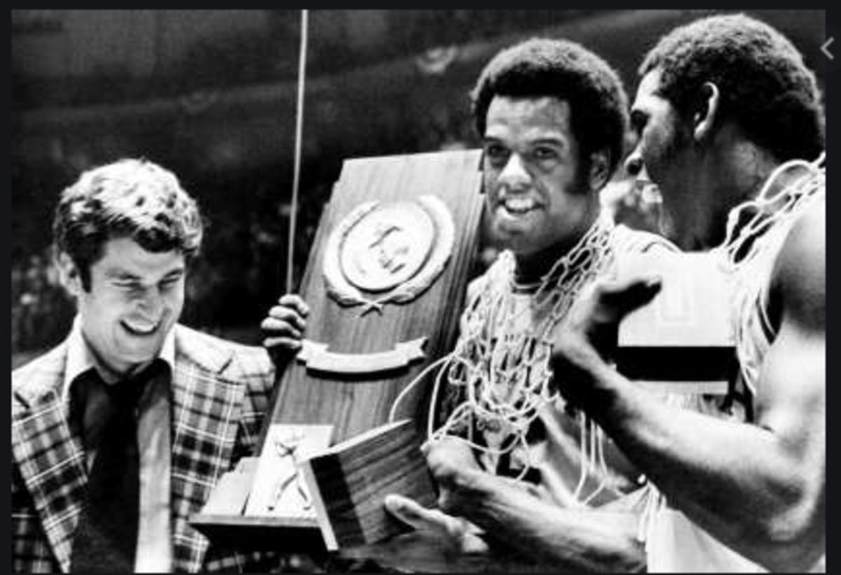 Bob Knight is all smiles while celebrating the 1976 national title with Scott May (center) and Quinn Buckner. (Courtesy IU Archives)