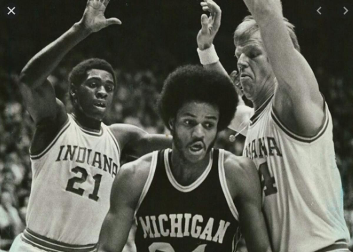 Quinn Buckner (left) and Kent Benson put the clamps on Michigan guard Ricky Green. (Courtesy: IU Archives)