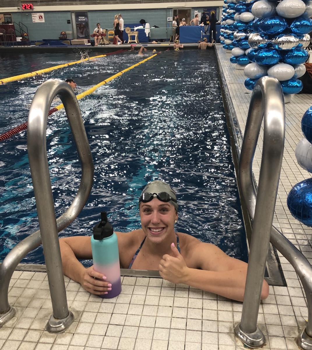 Abbey Weitzel celebrates after breaking the American record in the 50-yard freestyle