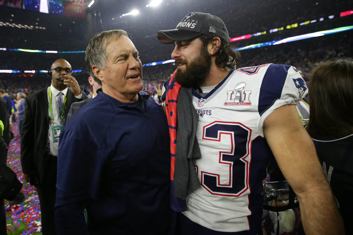 Feb 5, 2017; Houston, TX, USA; New England Patriots head coach Bill Belichick celebrates with defensive back Nate Ebner (43) after defeating the Atlanta Falcons during Super Bowl LI at NRG Stadium. The Patriots won 34-28.