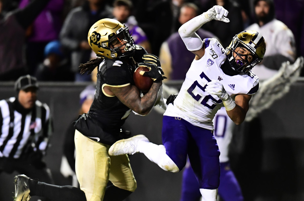 Nov 23, 2019; Boulder, CO, USA; Colorado Buffaloes wide receiver Laviska Shenault Jr. (2) catches a touchdown reception against Washington Huskies defensive back Trent McDuffie (22) in the second quarter at Folsom Field. Mandatory Credit: Ron Chenoy-USA TODAY Sports