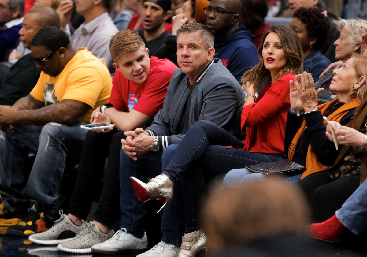 New Orleans Saints Sean Payton, son, and Skylene Montgomery