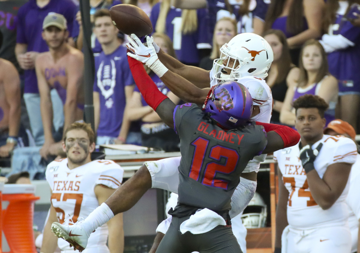 Oct 26, 2019; Fort Worth, TX, USA; TCU Horned Frogs cornerback Jeff Gladney (12) defends a pass intended for Texas Longhorns wide receiver Collin Johnson (9) during the fourth quarter at Amon G. Carter Stadium. Mandatory Credit: Kevin Jairaj-USA TODAY Sports