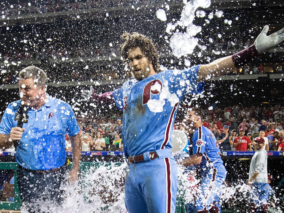 Bryce Harper doused with water