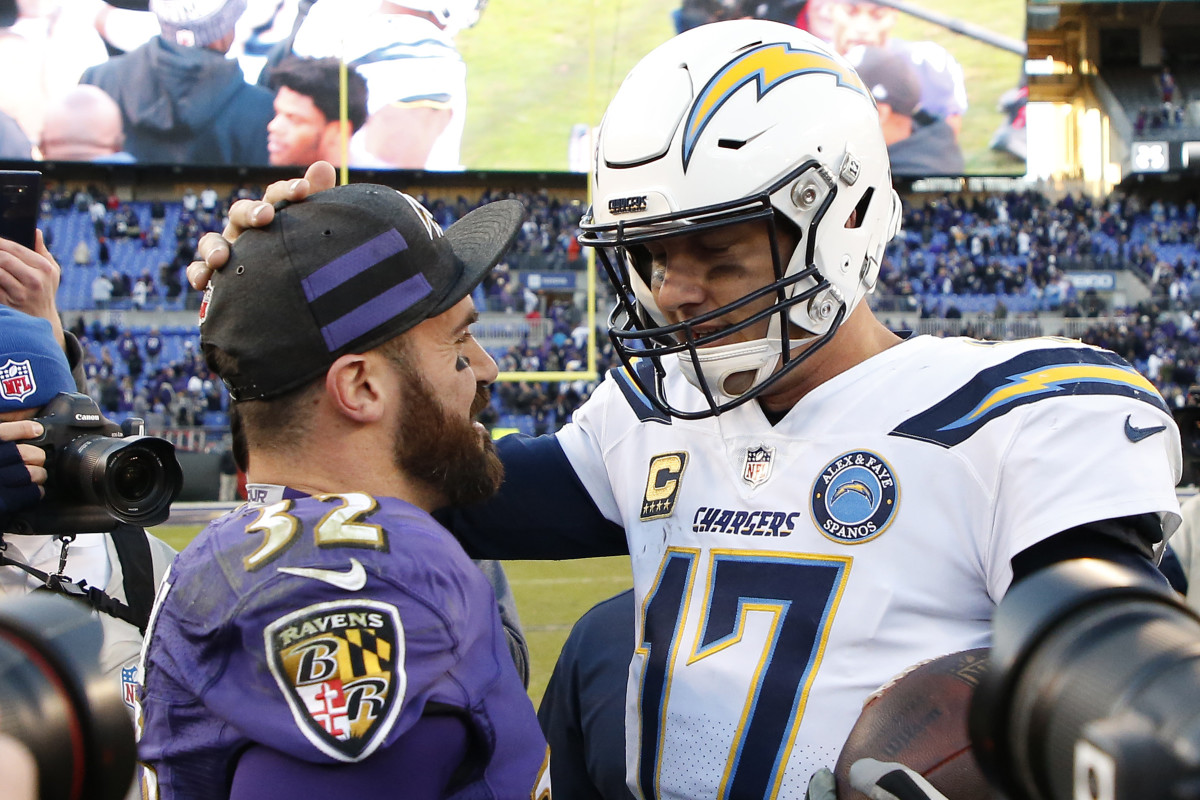 Jan 6, 2019; Baltimore, MD, USA; Los Angeles Chargers quarterback Philip Rivers (17) talks with Baltimore Ravens free safety Eric Weddle (32) after their game in a AFC Wild Card playoff football game at M&T Bank Stadium. The Chargers won 23-17. Mandatory Credit: Geoff Burke-USA TODAY Sports.