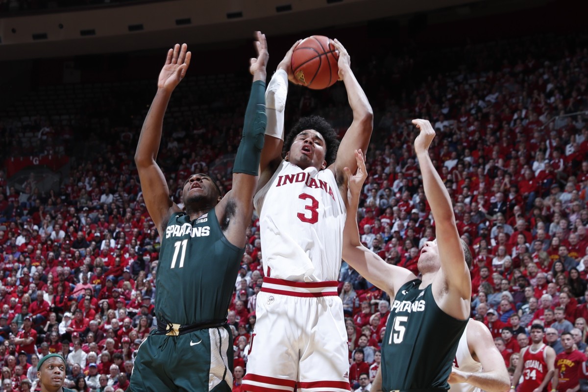 Indiana's Justin Smith grabs a rebound against Michigan State. (USA TODAY Sports)