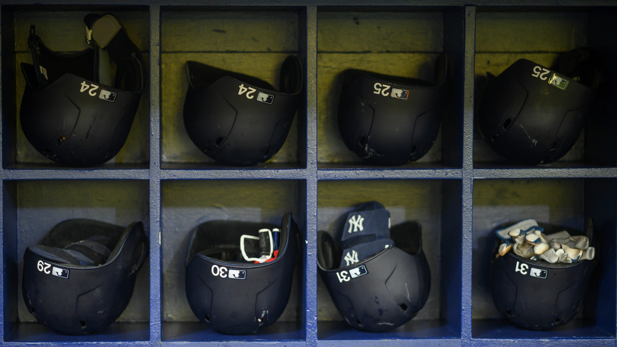 New York Yankees helmets are seen in the dugout prior to a game between the Tampa Bay Rays and the Yankees at Tropicana Field.